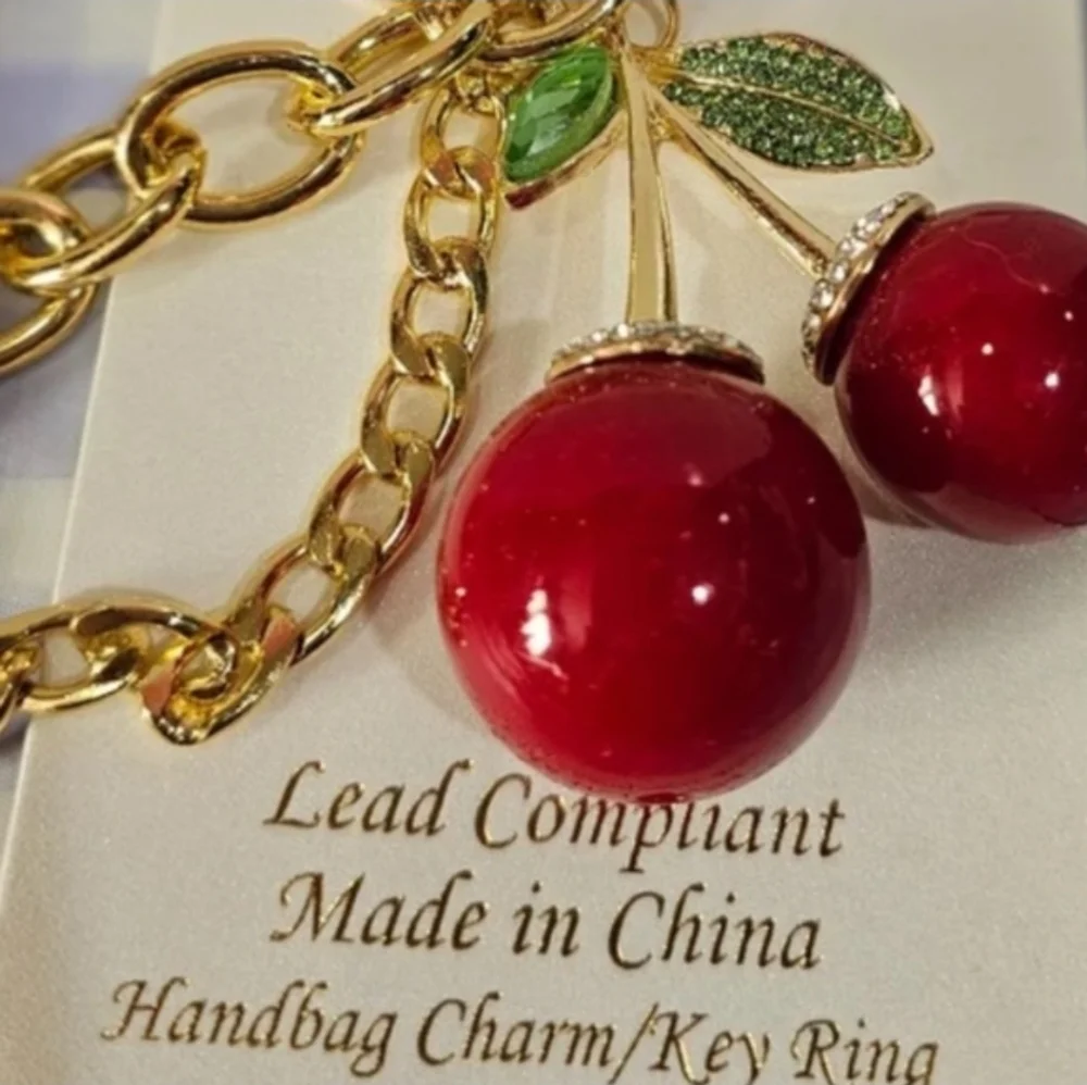 Natasha Couture charming key